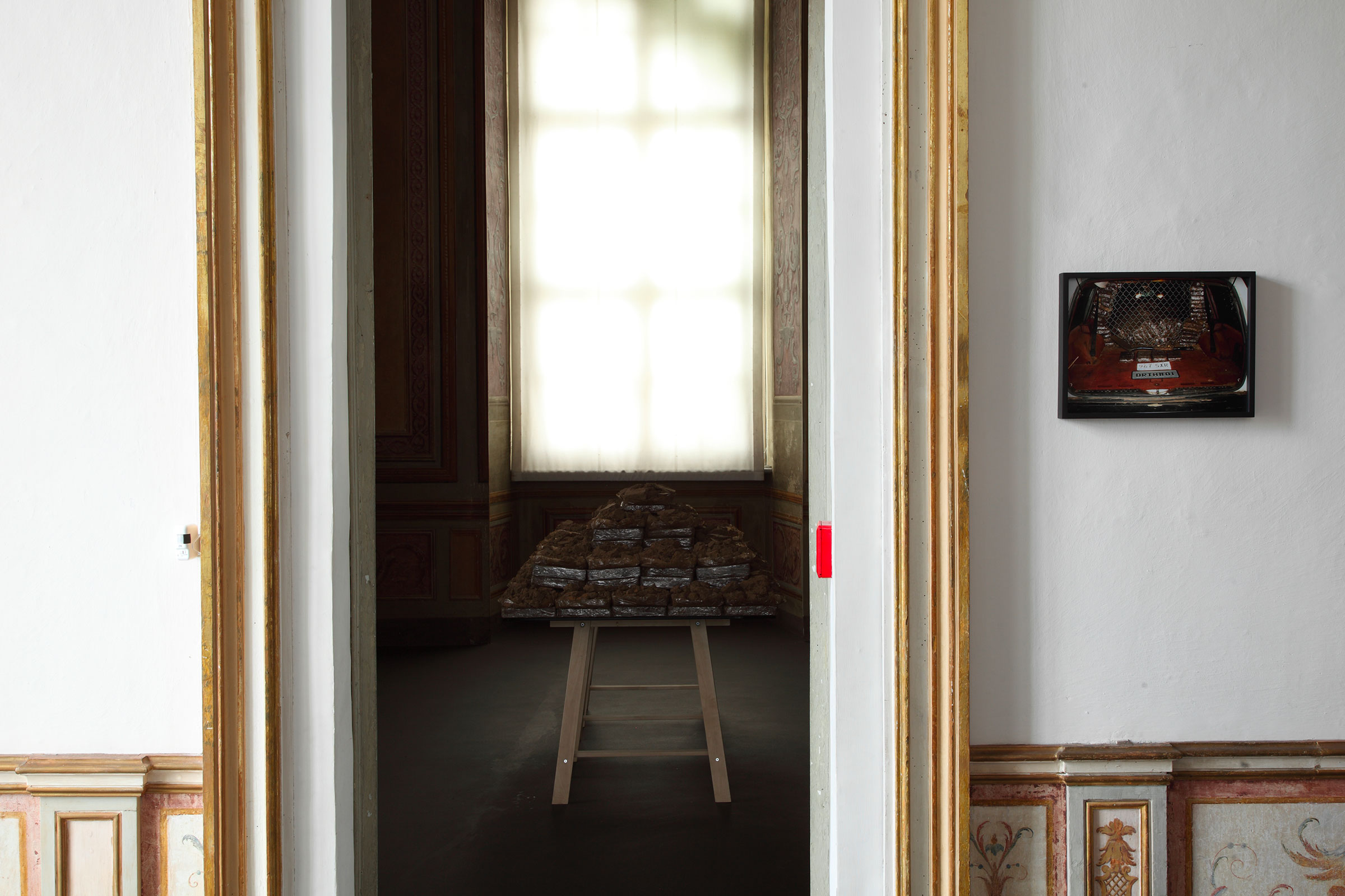 Matheus Rocha Pitta, Untitled still of Drive thru #1, 2007, Apprehension Table #2 (Pyramid), 2008